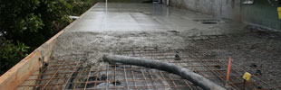commercial concreting contractors for factory foundation slabs and driveways.